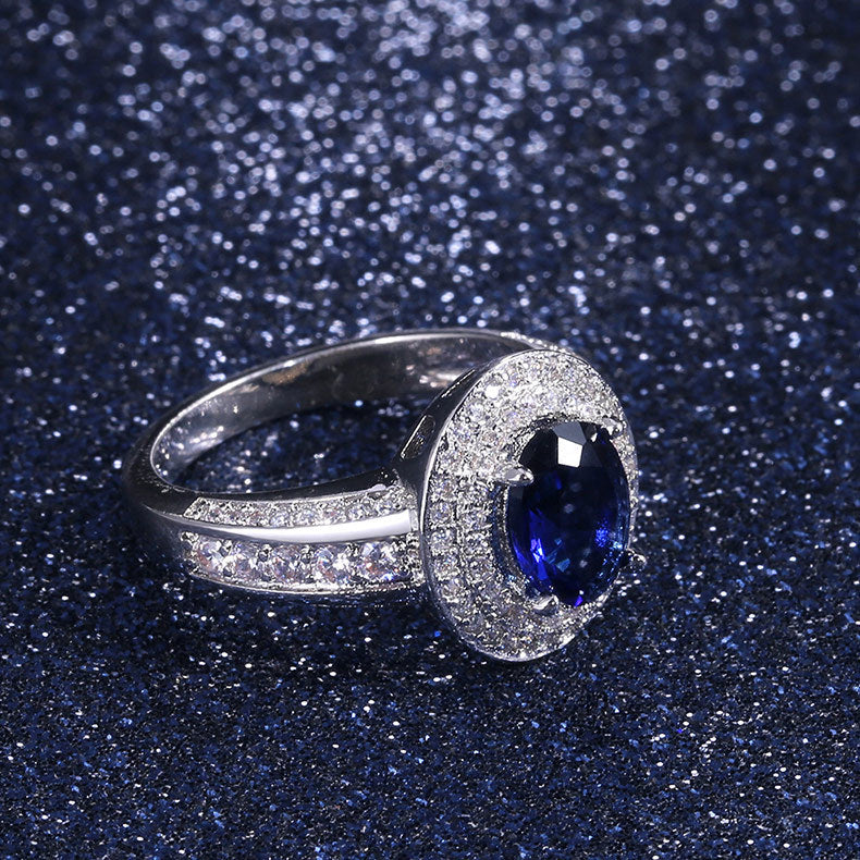 Classic four claw inlaid sapphire goddess ring