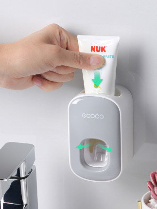 Wandmontierter automatischer Zahnpastahalter Badezimmerzubehör-Set Spender