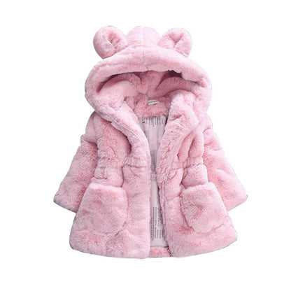 A fur coat for girls for autumn and winter 