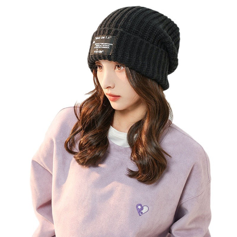 Big face makes face look smaller. Wool hat warm female