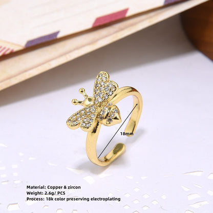 Open adjustable ladies ring in 18-carat gold with micro inlay and colored zircon