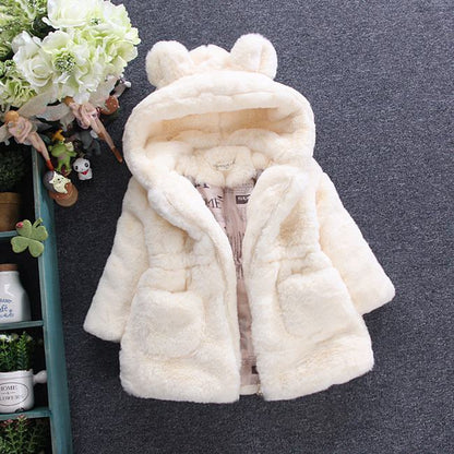 A fur coat for girls for autumn and winter 