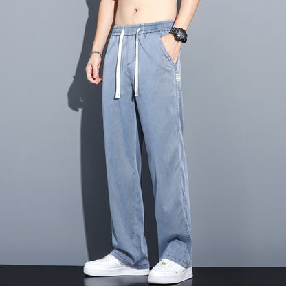 Sommer Weiche Lyocell Stoff Männer der Jeans Dünne Lose Gerade Hosen Kordelzug Elastische Taille Korea Casual Hosen Plus Größe M-5XL