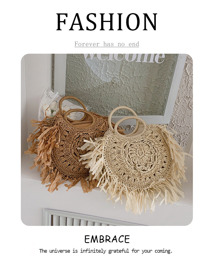 Hollow straw handbag with tassels