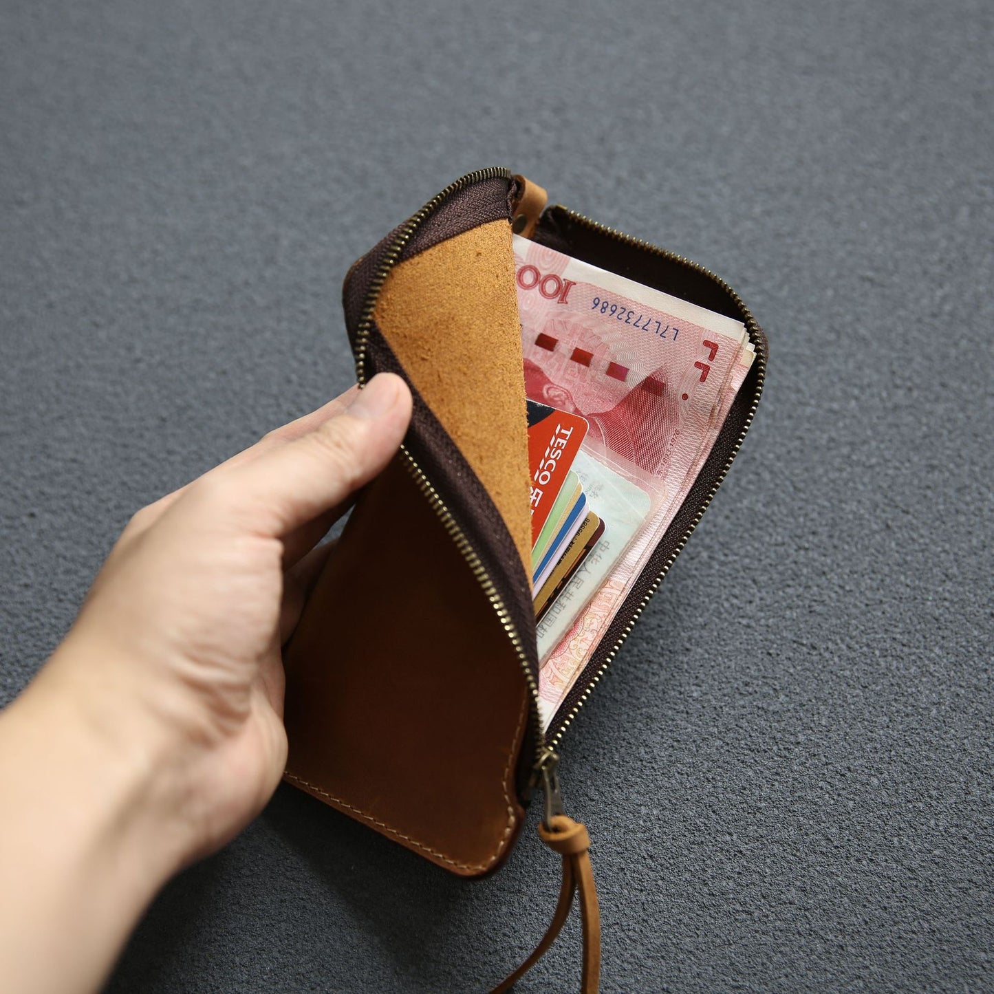 Leather wallet with belt and zipper