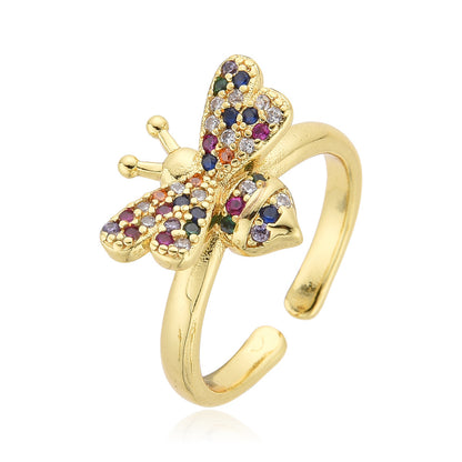 Open adjustable ladies ring in 18-carat gold with micro inlay and colored zircon